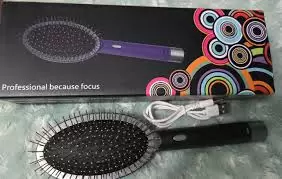 PEINE MASAJEADOR ELECTRÍCO