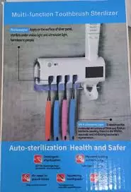 DISPENSADOR DE PASTA CON ESTERILIZADOR UV PARA CEPILLOS