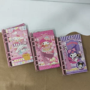 LIBRETA SANRIO CON AROS METALICOS TIPO CARPETA. TAMAÑO FRANCES