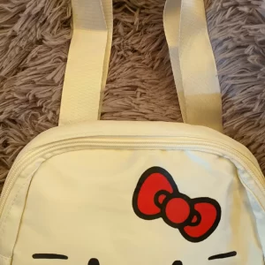 KITTY TIPO CANGURERA